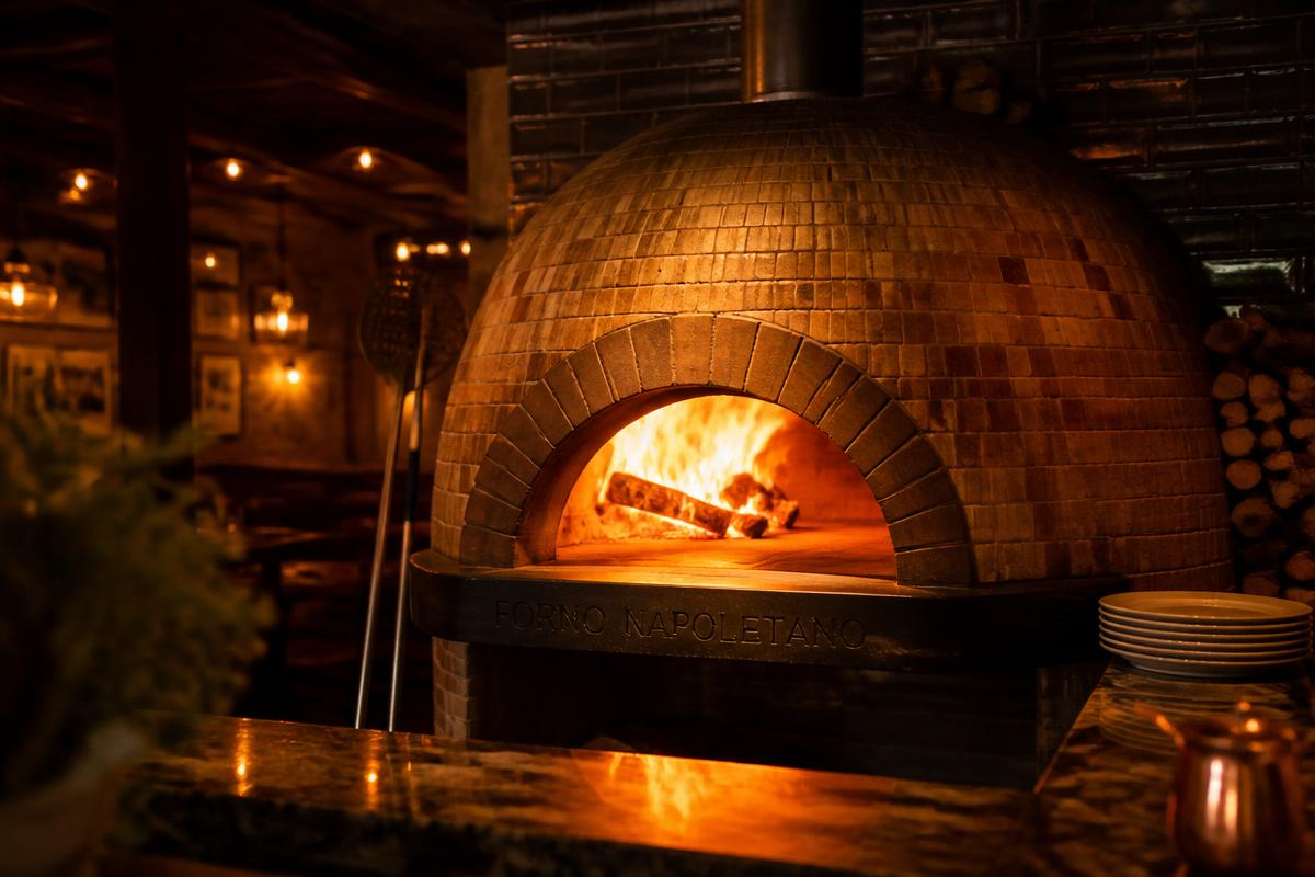 Glowing wood-fired brick oven